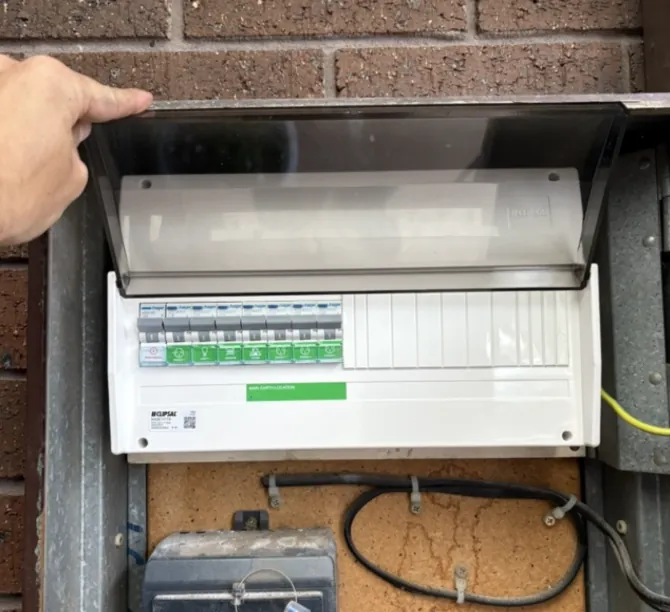 Melbourne electrician working on a residential switchboard